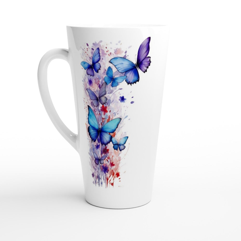 A tall white ceramic latte mug featuring a watercolor-style print of blue and purple butterflies with splashes of red and purple paint on the side, set against a plain white background.