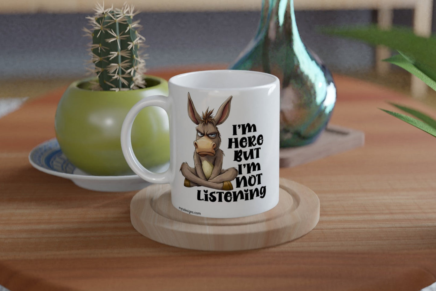 Funny “I’m Here But I’m Not Listening” donkey mug. Perfect sarcastic gift for coworkers, coffee lovers, and anyone sick of small talk. 11oz ceramic, Aussie-made.