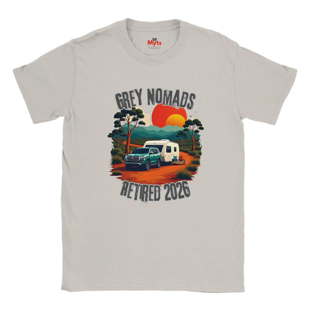 An Ice Grey crewneck t-shirt featuring a retro-style graphic of a camper trailer and truck on a dirt road with a sunset, accompanied by the text 'GREY NOMADS RETIRED 2026'. The inner collar shows the 'Myths' brand logo.
