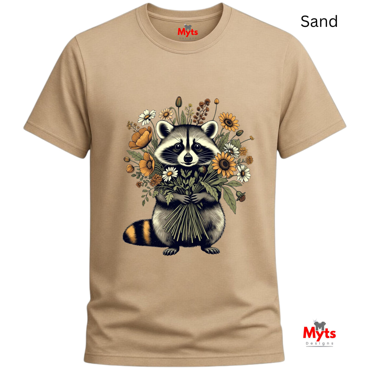 A sand-colored crewneck t-shirt featuring a graphic of a raccoon holding a bouquet of wildflowers. The shirt is displayed on a clean white background with 'Myts' branding visible on the inner neck label and as a watermark in the bottom right corner.