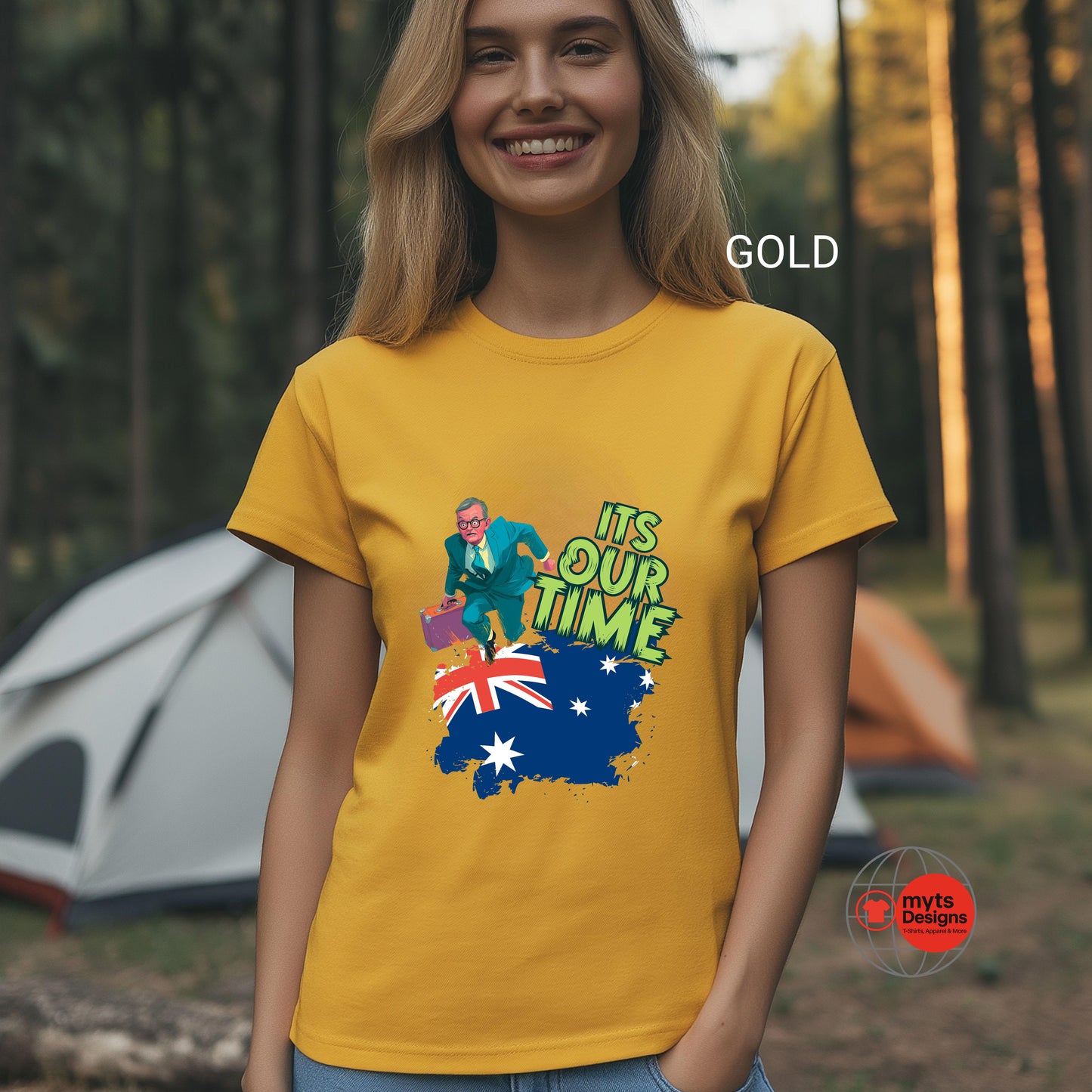 Person wearing a Gold-shirt with a graphic design in a forest setting