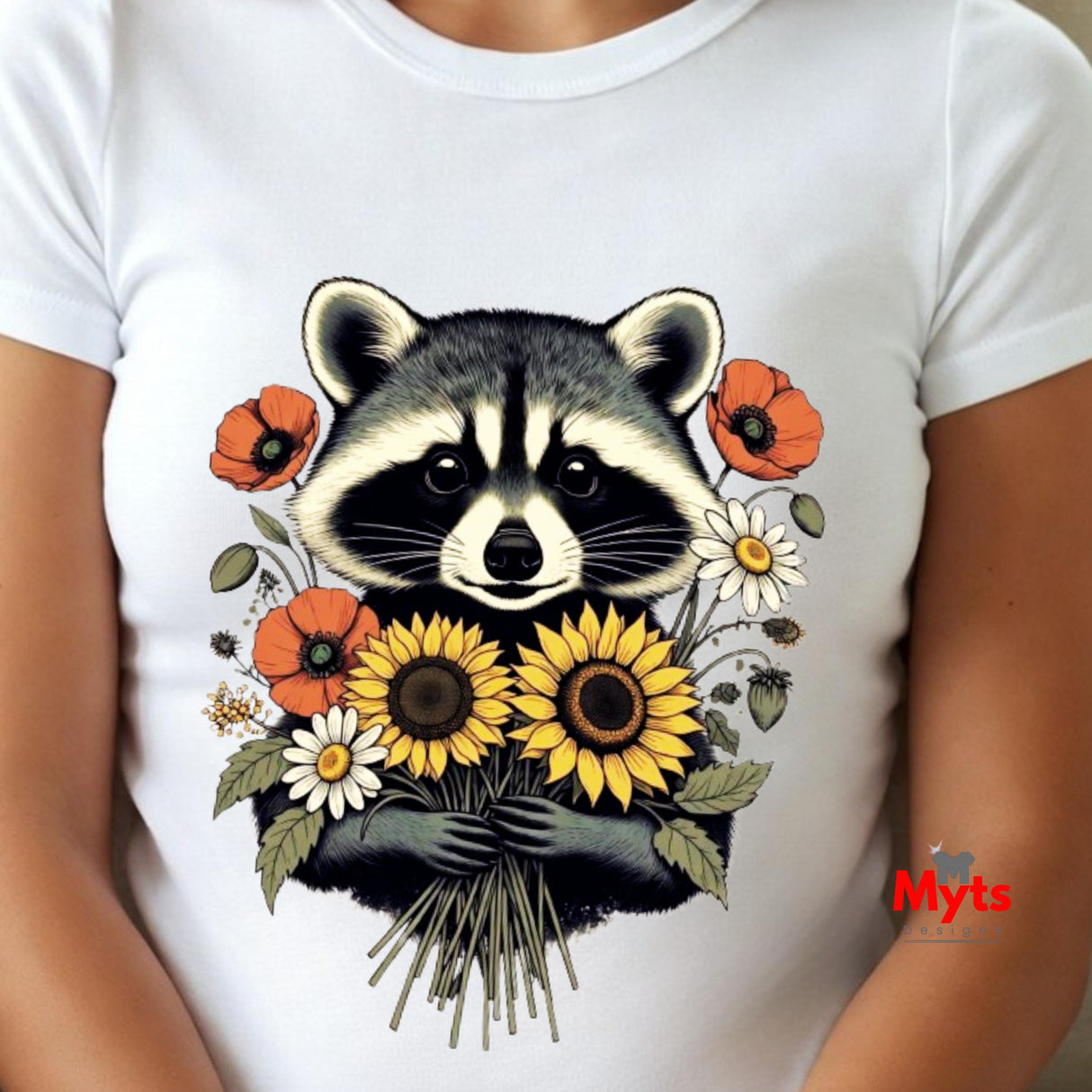 A white short-sleeve t-shirt featuring a detailed graphic print of a raccoon holding a bouquet of yellow sunflowers, orange poppies, and white daisies, shown on a model.