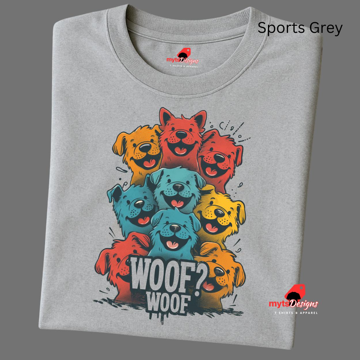 A folded sports grey T-shirt featuring a vibrant graphic of cartoon puppies stacked in red, orange, blue, and yellow hues, with the playful text “WOOF? WOOF” below the design.