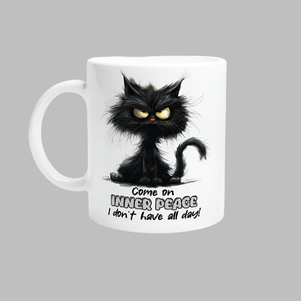 A white ceramic mug with a printed black cat design, text, and a barcode.