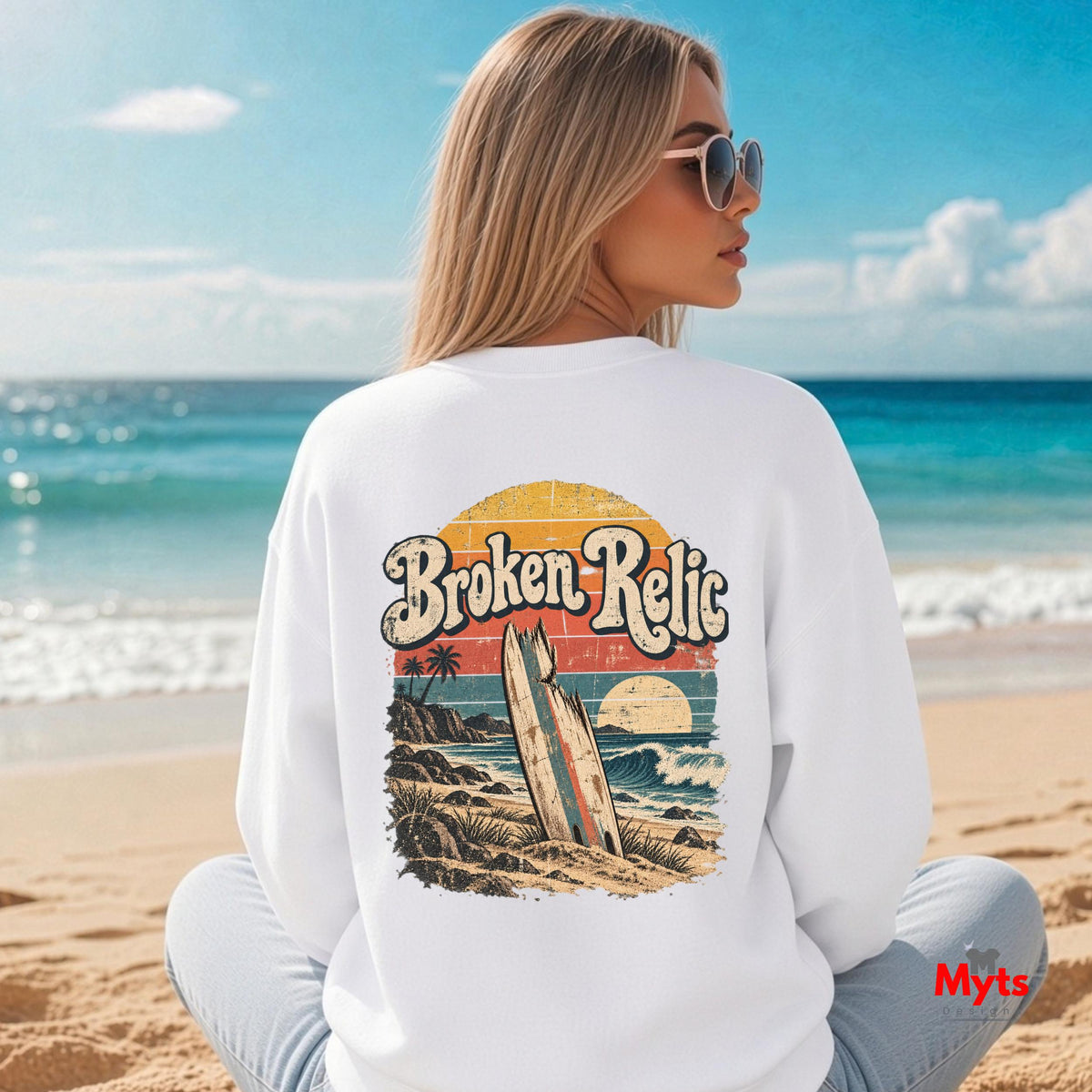 Broken Relic white unisex crewneck sweatshirt with small front surf graphic and large vintage surfboard beach design on back