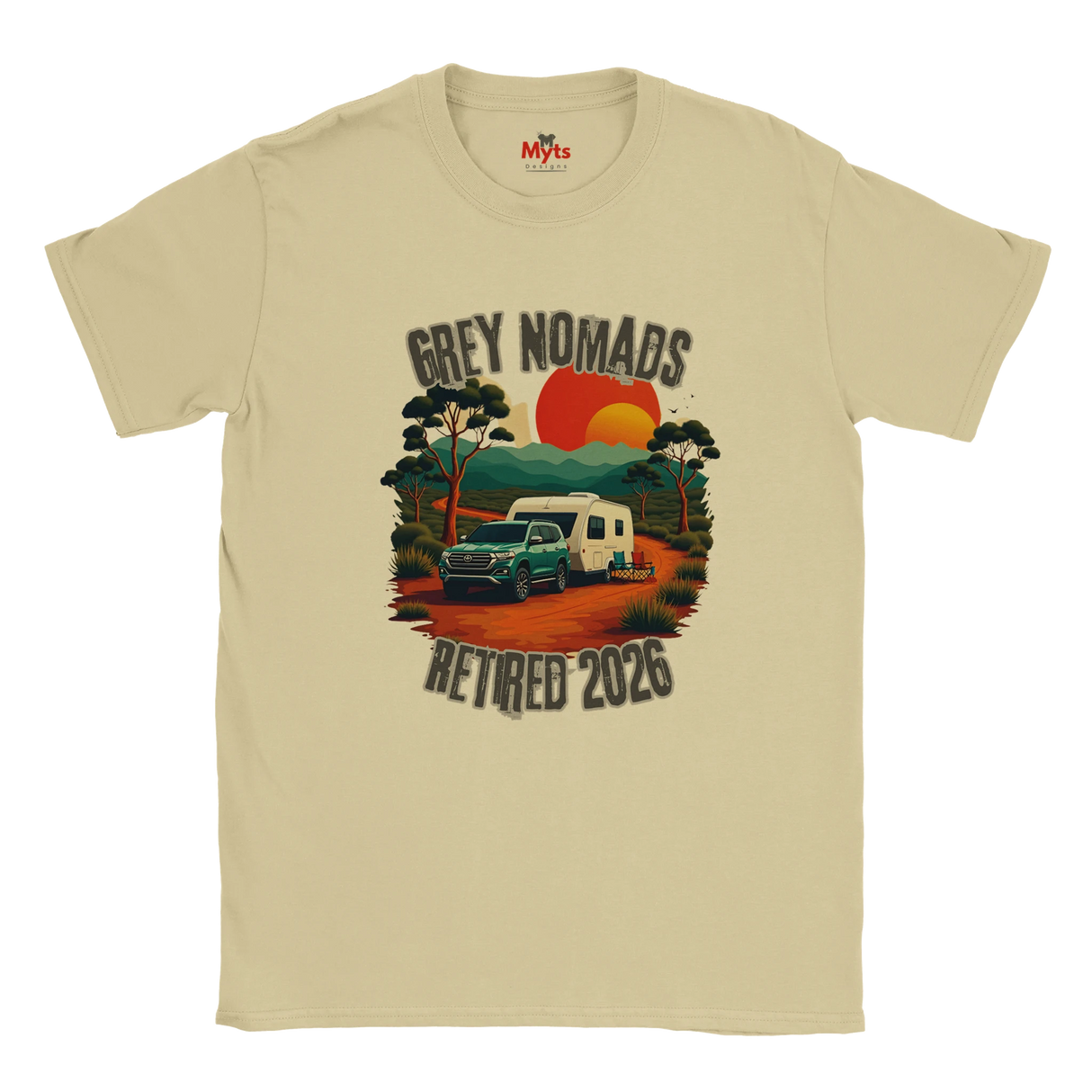 A Natural crewneck t-shirt featuring a retro-style graphic of a green camper trailer and truck on a dirt road with a sunset, accompanied by the text 'GREY NOMADS RETIRED 2026'. The brand 'Myths' is visible on the inner neck label.