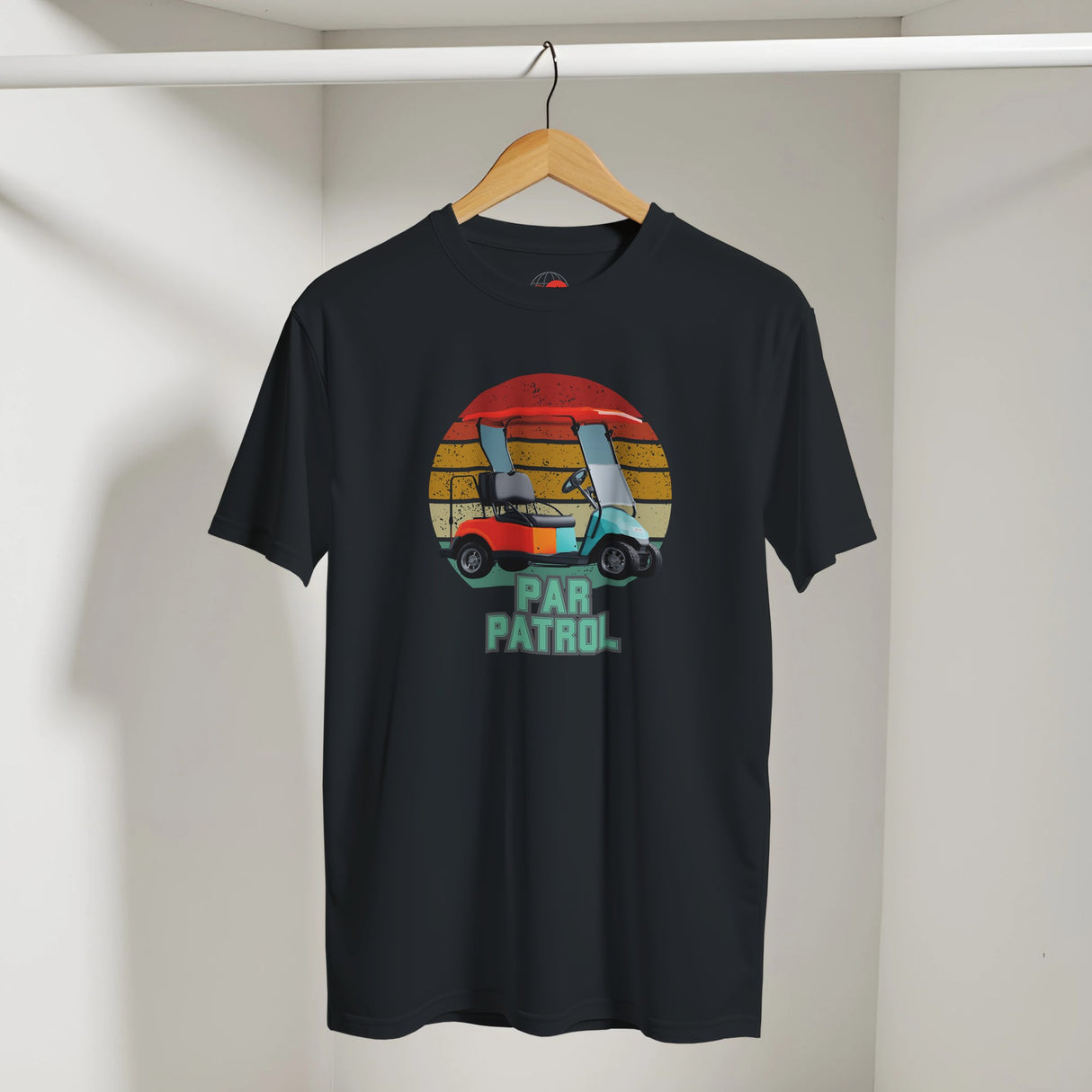Black t-shirt with a colorful graphic and 'Par Patrol' text on a hanger against a white wall.