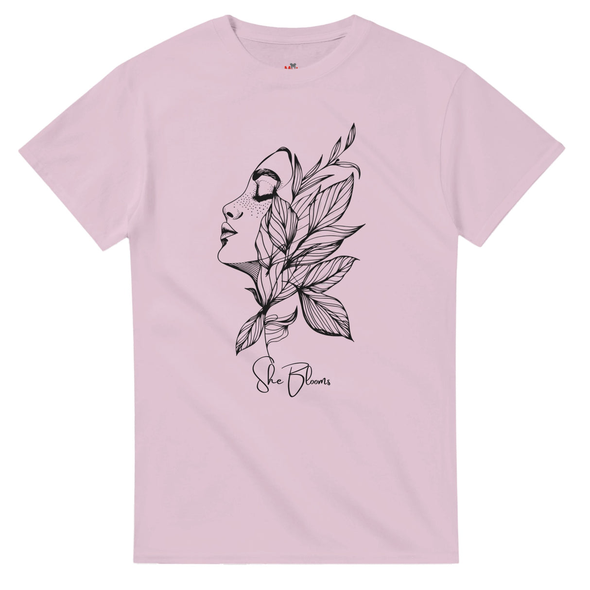 Pink t-shirt with a black floral and face design on a white background