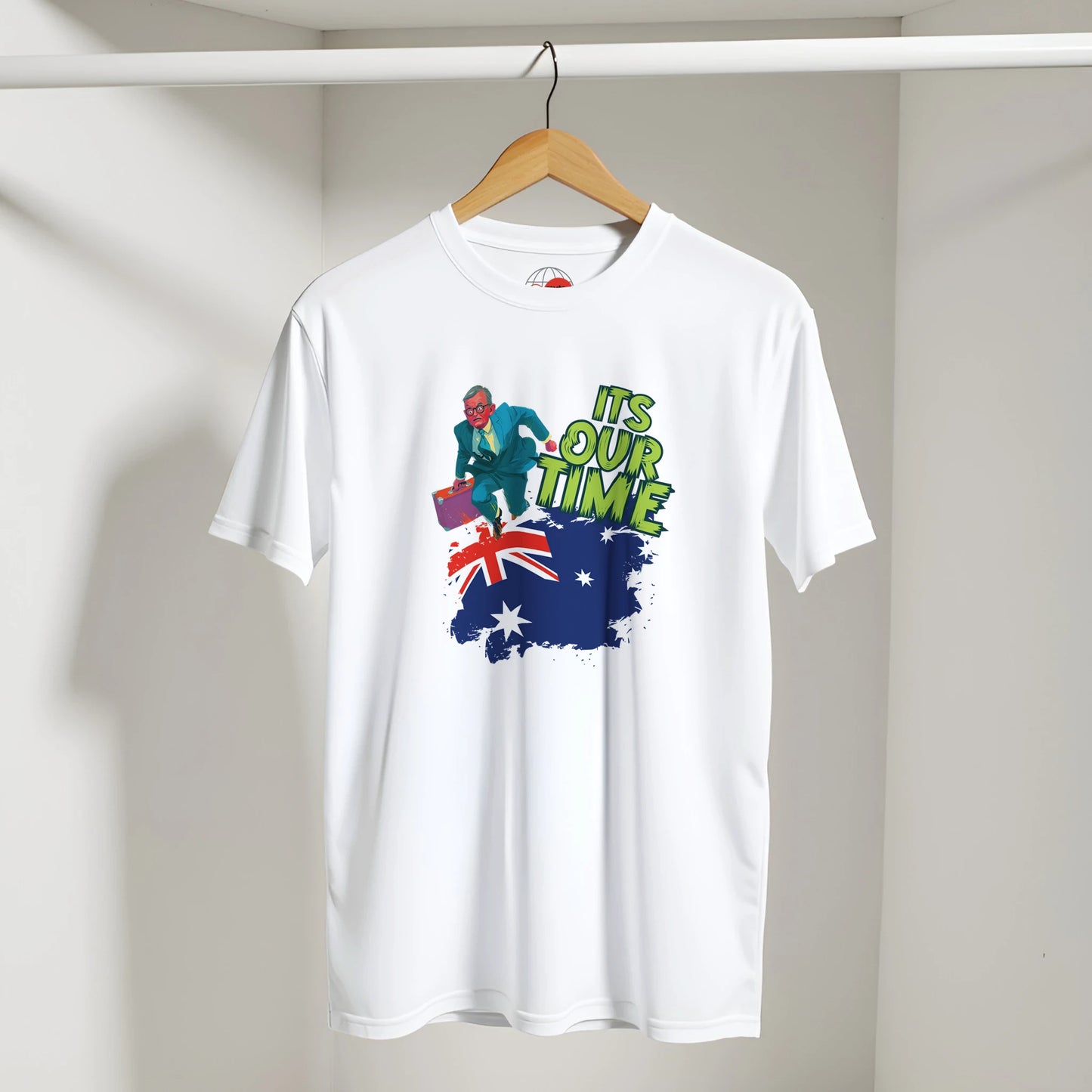 White t-shirt with a graphic design featuring an Australian flag and text on a hanger against a plain background.