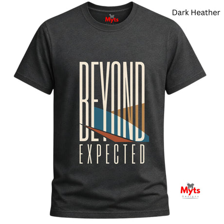A dark heather gray t-shirt with a graphic print that reads 'BEYOND EXPECTED' in beige, blue, and brown, displayed on a clean white background with brand and color labels.