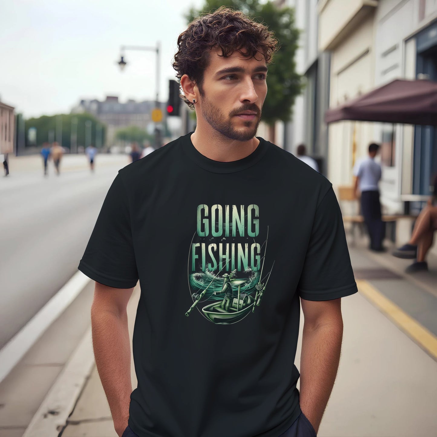 Man wearing a black t-shirt with 'Going Fishing' graphic on a city street.