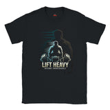 Black t-shirt with a graphic of a person lifting weights and the text 'Lift Heavy Become Unbreakable' on a white background.