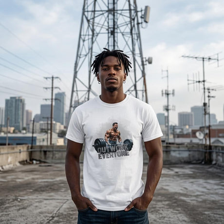 Person wearing a white t-shirt with a graphic design on a rooftop with cityscape in the background