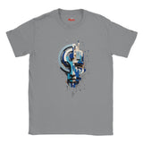 A ice gray crewneck t-shirt featuring a central graphic print of a stylized, geometric face in shades of blue, white, and black. The brand name 'Mylt' is printed in red inside the collar.