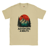Natural unisex cotton T-shirt with a retro “Adventure Awaits” camping graphic—featuring a vintage tent scene, outdoors motif, and bold typography; soft Gildan 64000 fabric from MytsDesigns.