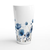 A white tapered drinking cup featuring a watercolor-style floral print of blue poppies and stems, shown on a clean white background.