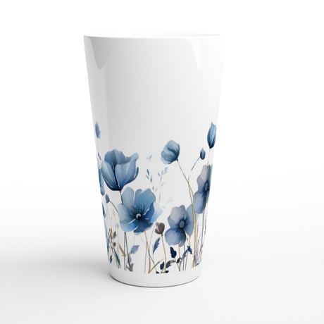 A white tapered drinking cup featuring a watercolor-style floral print of blue poppies and stems, shown on a clean white background.