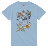 A light blue crewneck t-shirt featuring a 'Midnight Spirit' graphic print with a moth, flowers, and leaves on a solid white background.