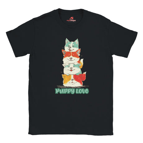 A flat lay black T-shirt featuring a colorful graphic of four stacked cartoon puppies in teal, orange, cream, and yellow shades with the words “Puppy Love” in playful green text below

