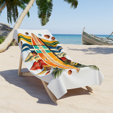 Colorful towel with a tropical design on a beach chair by the ocean