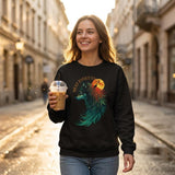 A woman stands on a sunlit city street wearing a black crewneck sweatshirt with a colorful wolf graphic and the words 'NEW EVOLUTION'. She is holding an iced coffee.