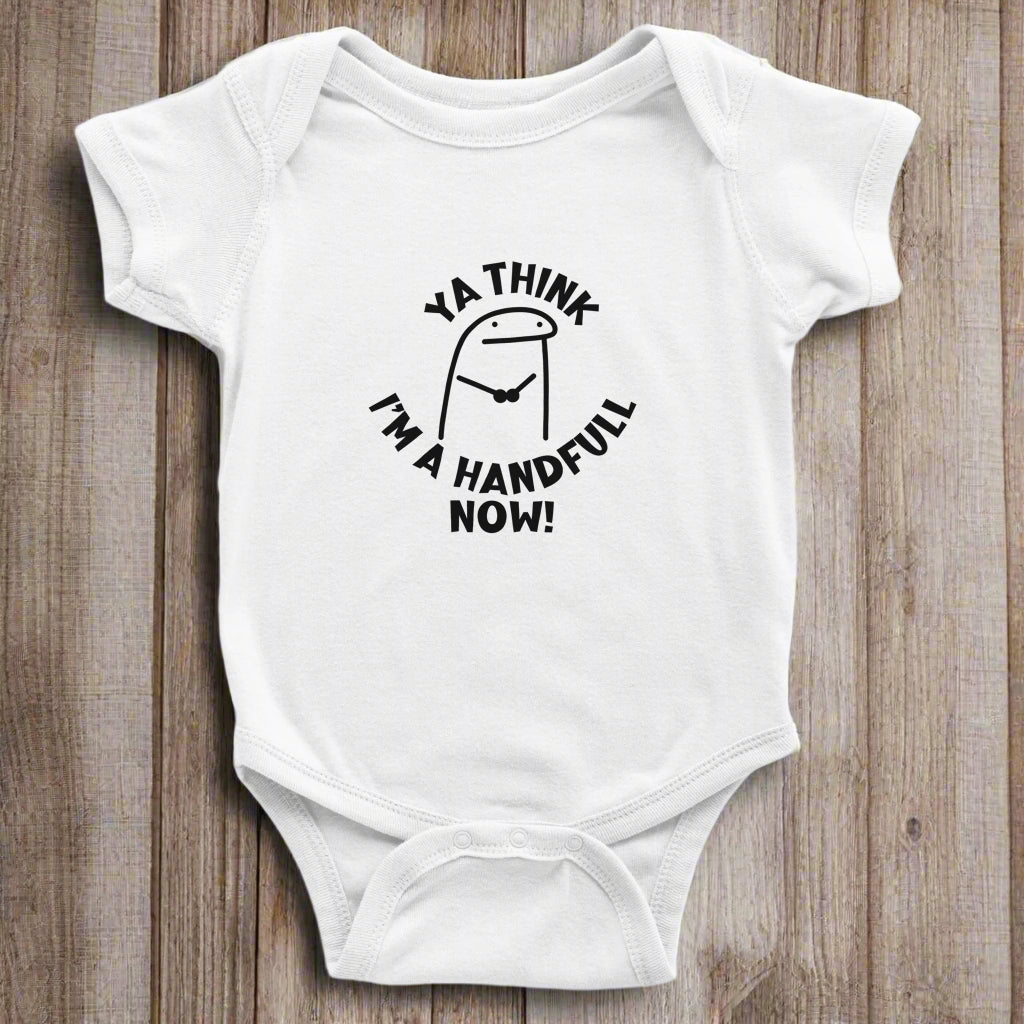A white short sleeve bodysuit for babies with the text 'YA THINK I'M A HANDFUL NOW!' printed on the front.