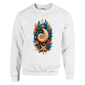 A white crewneck sweatshirt featuring a colorful graphic print of a nautilus shell surrounded by blue, orange, and green seashells and starfish, with a visible Gildan brand label inside the collar.