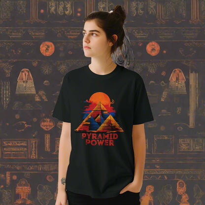 A young girl wearing a black T-shirt with pyramids and sacred geometric lines – bold sun set symmetrical design on Gildan cotton 
