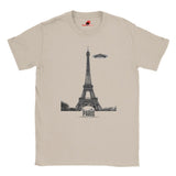 Front view of a netural soft casual tee featuring a whimsical graphic of the Eiffel Tower with a retro‑style spaceship orbiting it, printed on ultra‑soft Gildan 64000 cotton.