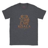 A dark heather gray crewneck t-shirt featuring a distressed orange graphic of a koala sitting on a branch with the text 'KOALA LIVE GENTLY' printed on the chest.