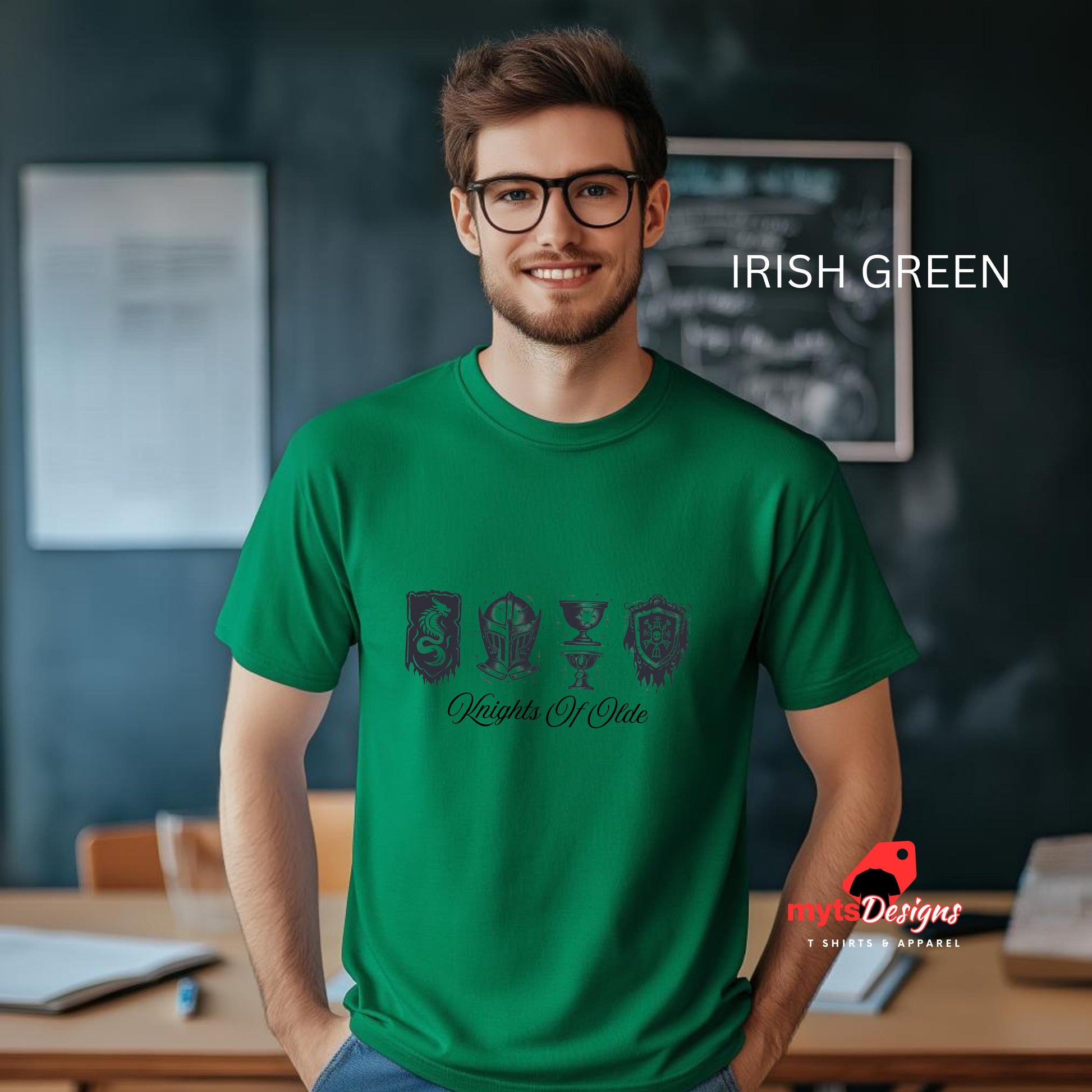 Man wearing a green t-shirt with a design in an indoor setting, likely a classroom.