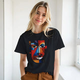 Person wearing a black t-shirt with a colorful abstract face design.