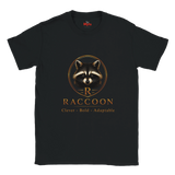 A black short-sleeve crewneck t-shirt featuring a graphic of a raccoon inside a circular frame with the letter 'R' and the word 'RACCOON' printed below in gold, with the tag 'The Myls' visible inside the collar.