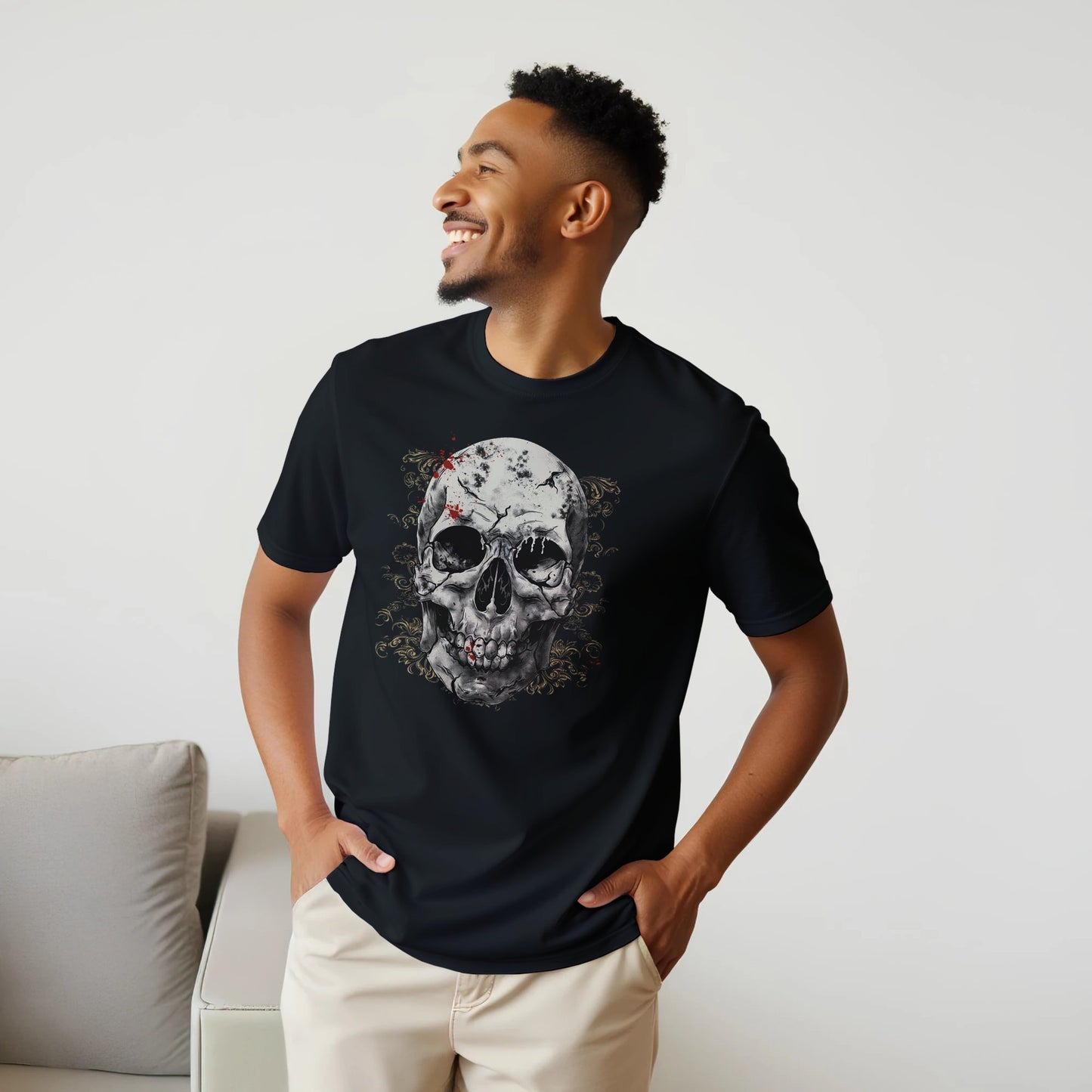 Man wearing a black t-shirt with a skull design, standing against a plain background.