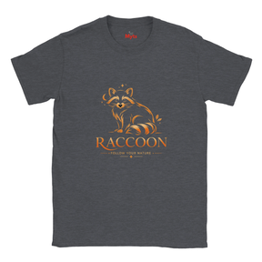 A dark heather gray crewneck t-shirt featuring a stylized orange and brown raccoon graphic with the word 'RACCOON' and the phrase 'FOLLOW YOUR NATURE' printed on the front.
