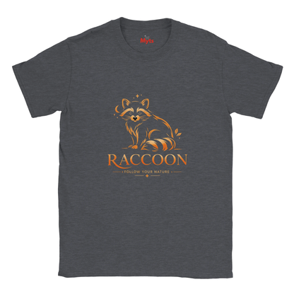 A dark heather gray crewneck t-shirt featuring a stylized orange and brown raccoon graphic with the word 'RACCOON' and the phrase 'FOLLOW YOUR NATURE' printed on the front.