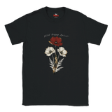 A black short-sleeve crewneck t-shirt featuring a vintage-style botanical graphic of wild poppies in red, white, and muted green, with the text 'Wild Poppy Spirit' printed above the flowers. The brand logo 'MMS' is visible inside the collar.