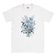 A white short-sleeve crewneck t-shirt featuring a central graphic print of a bouquet of light blue flowers and green eucalyptus leaves, with a small red 'Myts' logo printed inside the collar.