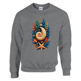 A heather gray crewneck sweatshirt featuring a colorful graphic print of a nautilus shell, starfish, and seashells on the front, displayed on a clean white background.