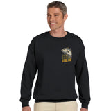 Man wearing a black sweatshirt with a fish graphic and text on a white background