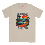 A Sand crewneck t-shirt featuring a retro-style graphic of a green pickup truck towing a white camper on an orange dirt road, with a red and orange sunset and the text 'GREY NOMADS RETIRED 2026'. The inner collar shows the 'Myts' brand logo.