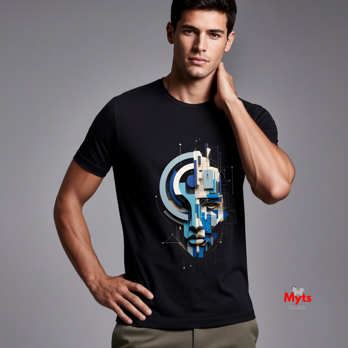 A man wearing a black short-sleeve t-shirt with a blue and white geometric digital face graphic on the front, posed against a solid gray studio background.