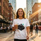 Woman in a white t-shirt with a graphic design on a city street