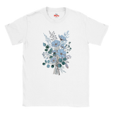 A white short-sleeve crewneck t-shirt featuring a central graphic print of a bouquet of light blue flowers and green eucalyptus leaves, with a small red 'Myts' logo printed inside the collar.