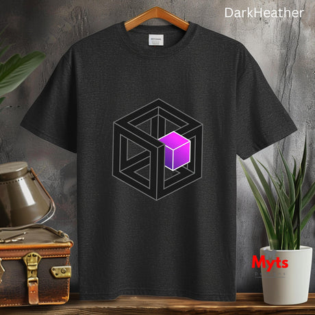 Dark Heather t-shirt with geometric cube design on a wooden surface with plants and a suitcase.