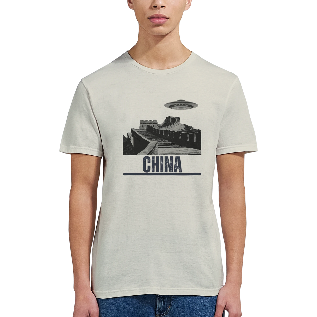 “Woman wearing a white T-shirt with a vintage black-and-white Great Wall of China illustration and a UFO hovering above it, labeled ‘CHINA,’ designed by MytsDesigns.com in a gym setting”

