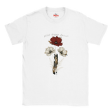 A white short-sleeve crewneck t-shirt featuring a graphic print of wild flowers and a feather on the front, with the text 'Wild Flower Spirit' and a red 'Myts' logo printed inside the collar.
