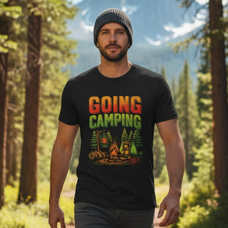 Man wearing a 'Going Camping' t-shirt in a forest with mountains in the background