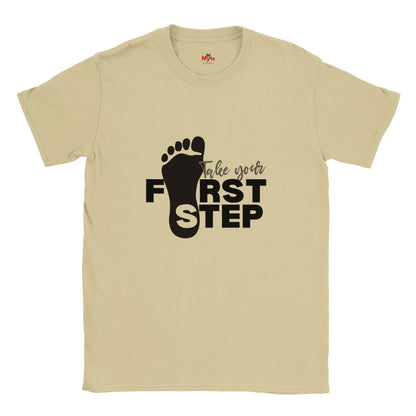 Neutral t-shirt with black footprints and text 'Take your First Step' on a white background