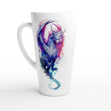 A tall white ceramic latte mug featuring a colorful watercolor-style illustration of a fantasy creature in shades of blue, purple, and pink, set against a clean white background.